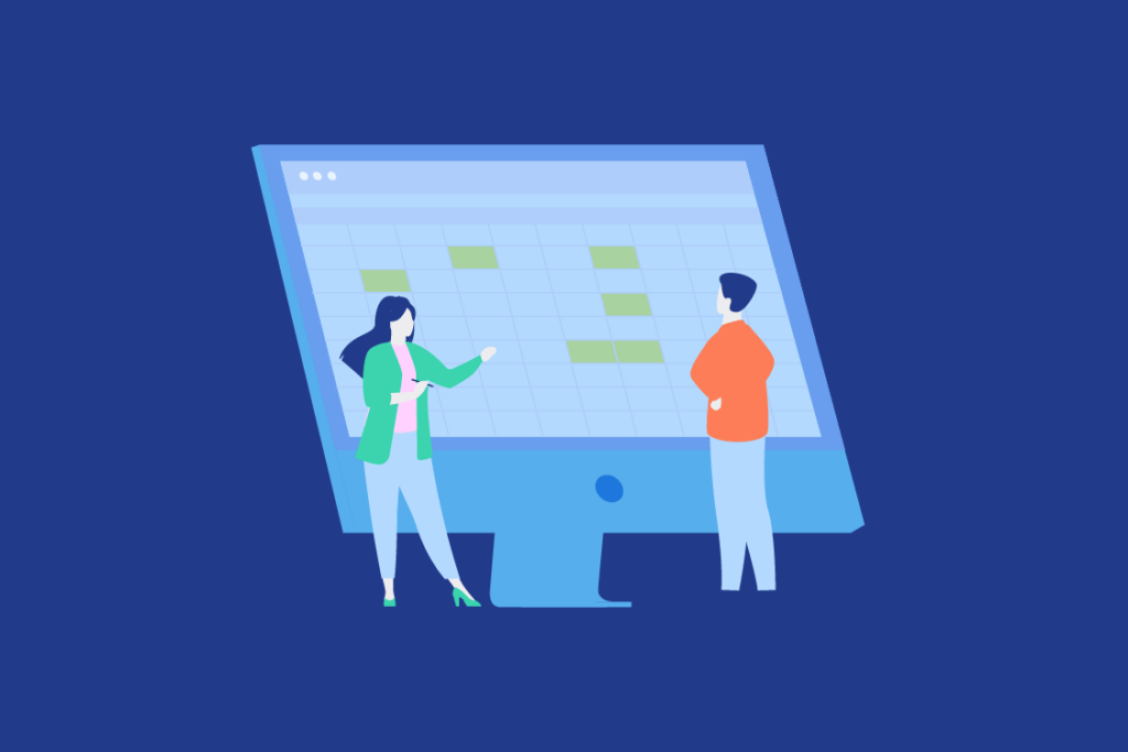 Personas revisando datos en un computador para ilustrar los Tipos de Reporte de Sostenibilidad que las empresas deben elaborar